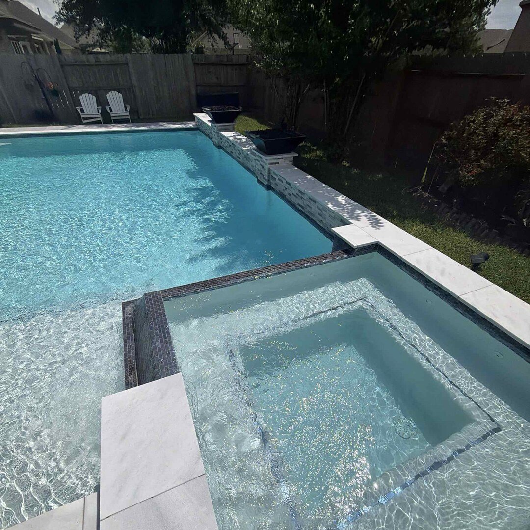Pool and spa with beautiful landscaping in Katy TX