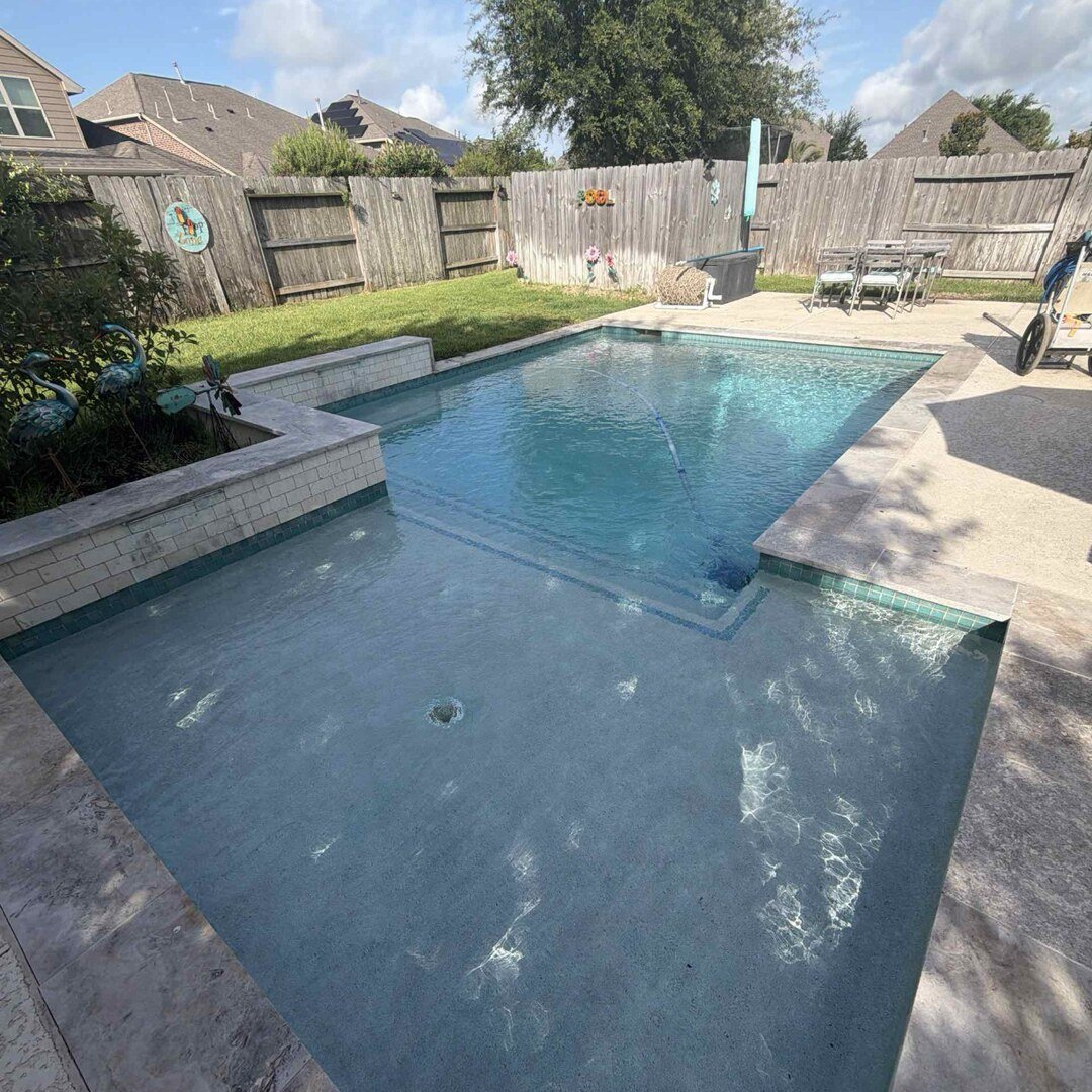 Pool with fountain feature in Cypress TX